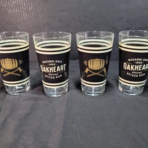 Set of 4 Bacardi Oakheart Genuine Spiced Rum Drinking Glasses.