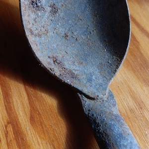 Handwrought iron longnecked 20 1/2&quot; spoon with hooked top plus hole for hanging. Salvaged from a barn in upstate NY. Original provenance.