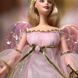 BARBIE- Angelic Harmony. 2001. Pink gossamer gold gown, iridescent wings, gold crown & trumpet. Rare, beautiful. Free shipping in USA only.