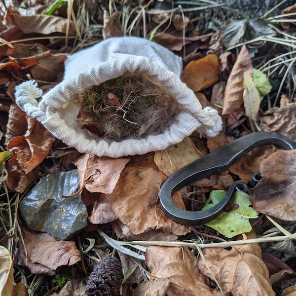 Viking Fire starting kit containing flint and steel and tinder pouch