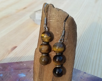 Pendientes de perlas de ojos tigre cuelgan pendientes de acero