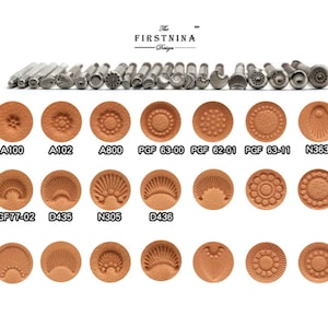 May include: A collection of metal leather stamping tools arranged in a row, with corresponding circular impressions on tan leather below. Each stamp is labeled with alphanumeric codes like A100, PGF 63-00, and N363. The text The FIRSTNINA Design is centered at the top.