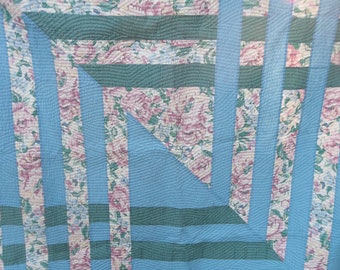 Modern quilted throw/large wall hanging. Blue, green and floral cotton fabrics