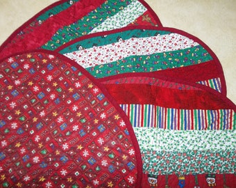 Christmas quilted cotton reversible placemats; set of four