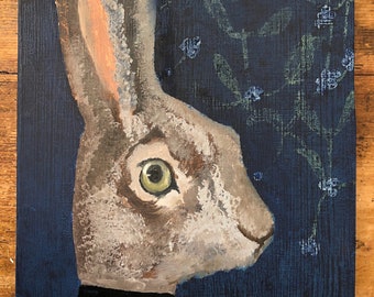 Harriet Hare with Blue Surround and Mottled Foliage