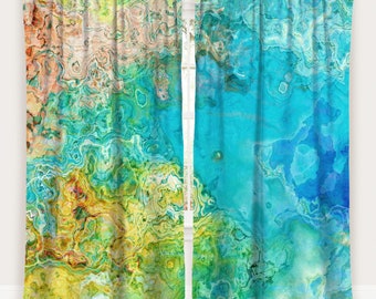 May include: Two abstract curtain panels with a swirling, marbled design in shades of blue, green, yellow, and orange. The panel on the left has more yellow and orange tones, while the panel on the right is predominantly blue.