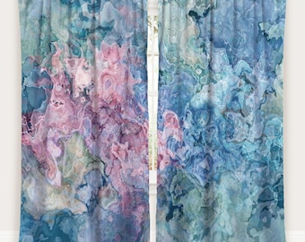 May include: Two-panel curtain set with an abstract design. The curtains feature a blend of colors, including shades of blue, teal, and pink, creating a marbled effect. The design is reminiscent of watercolor or agate stone patterns.