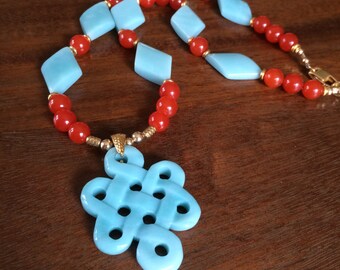 Celtic knot necklace in amazonite, tangerine glass, and gold vermeil