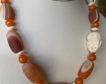Botswana agate necklace with hand-carved bone rabbits