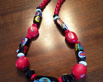 Red and black millefiori, coral, and onyx necklace