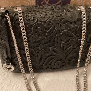 Brighton Leather Black Purse, New in original box, never worn, soft Lacey leather black over lay, single or double silver chain handle.