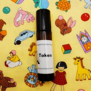 Token Perfume-Thai Tea, coconut milk, cardamom, condensed milk, brown sugar boba, anise-rollerball perfume