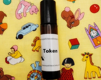 Token Perfume-Thai Tea, coconut milk, cardamom, condensed milk, brown sugar boba, anise-rollerball perfume