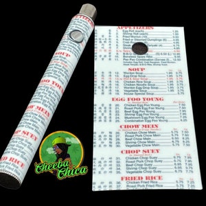 May include: A white and silver vape pen with a printed menu of Chinese food items. The menu includes appetizers, soups, and various dishes like Chow Mein and Chop Suey. A logo of a woman with a green hat is also visible.