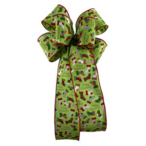 Green Christmas Bow with &quot;Merry Christmas&quot; and Festive Stockings