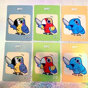Jeton Oiseau magique 2/2 - Angry Bird avec couteau - métallisé ou non - Ara, perroquet, oiseau bleu