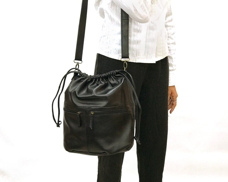 Black Drawstring backpack leather Drawstring bag Women shoulder bag Zippered pockets Men Rucksack