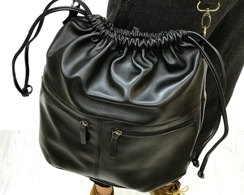 Black Drawstring backpack leather Drawstring bag Women shoulder bag Zippered pockets Men Rucksack