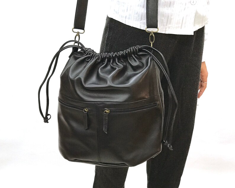 Black Drawstring backpack leather Drawstring bag Women shoulder bag Zippered pockets Men Rucksack