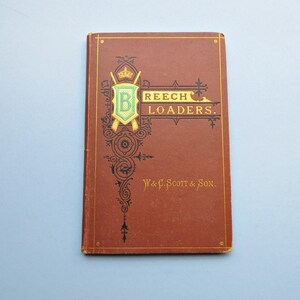 May include: A vintage book with a dark red cover and gold trim. The title "BEECH LOADERS" is displayed in gold lettering, along with the text "W & G. Scott & Son." A green and gold emblem is featured on the cover.