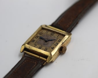 Mechanisch horloge ter ere van het eeuwfeest, verguld.