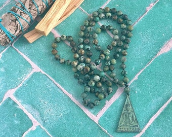 Mala Beads For Change - Buddha Pendant Mala Necklace - African Turquoise Mala Beads - 108 Bead Mala - Third Eye Chakra Mala - Seated Buddha