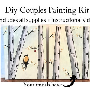May include: DIY Couples Painting Kit includes all supplies and an instructional video. Two canvases depict a forest scene with birch trees, a bird, and a heart with the words "Love" inside. The text "Your initials here" is written below the canvases.