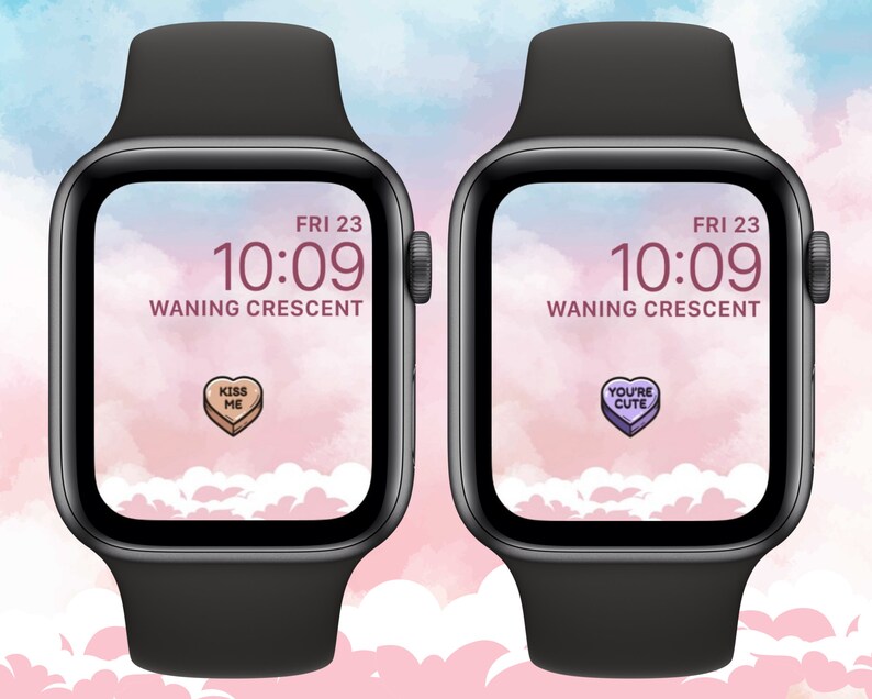 May include: Two Apple Watch faces with a pink and blue watercolor background. The time is 10:09 and the date is FRI 23. The moon phase is Waning Crescent. One watch face has a pink candy heart with the text "KISS ME" and the other watch face has a purple candy heart with the text "YOU'RE CUTE".