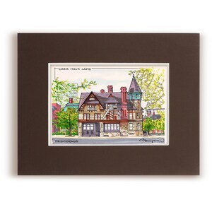 May include: A watercolor illustration of a building with a sign that reads "Carr Haus Cafe" and "Providence". The building is a multi-story structure with a tower and a porch. The illustration is framed in a brown mat.