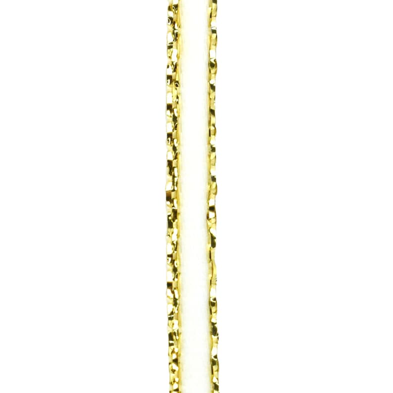 May include: Gold trim ribbon with a white center.