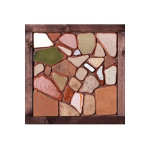 May include: A square mosaic artwork featuring irregularly shaped pieces in shades of brown, beige, green, and pink, set within a dark brown wooden frame. The mosaic has a rustic, natural aesthetic, suitable for home decor.