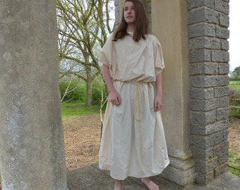 Disfraz histórico de túnica griega sencilla de algodón color crema liso unisex