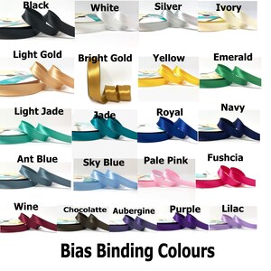 May include: A chart of bias binding colors, showing samples of each color in a row. The colors are: Black, White, Silver, Ivory, Light Gold, Bright Gold, Yellow, Emerald, Light Jade, Jade, Royal, Navy, Ant Blue, Sky Blue, Pale Pink, Fuschia, Wine, Chocolate, Aubergine, Purple, Lilac. The text "Bias Binding Colours" is at the bottom of the chart.