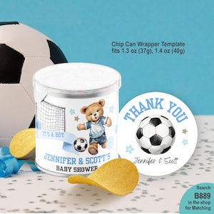 May include: A cylindrical chip can with a wrapper featuring a teddy bear in a blue football kit, a football goal, and the text 'It's a boy', 'Jennifer & Scott's Baby Shower', and 'Chip Can Wrapper Template fits 37g, 40g'. Includes a round sticker.