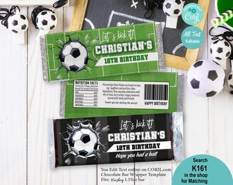 May include: Chocolate bar wrappers with a soccer theme. The wrappers feature a soccer ball bursting through a green field and a black and white striped background. Text includes "Let's kick it!" and "CHRISTIAN'S 12TH BIRTHDAY".
