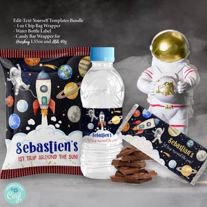 May include: A set of printable party favor labels featuring a space theme. The labels include a rocket, planets, and stars on a dark blue background. The text on the labels reads "Sebastien's 1st Trip Around the Sun!" The labels are designed for 1 ounce chip bags, water bottles, and candy bars.