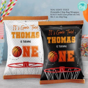 May include: Printable chip bag wrappers with a basketball theme. The wrappers are black and white with orange accents and feature the text "It's Game Time! Thomas is turning One".