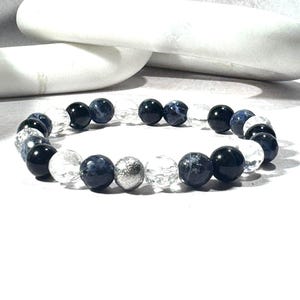 Pulsera difusora de ojo de tigre y cuarzo transparente, hecha a mano en el Reino Unido.
