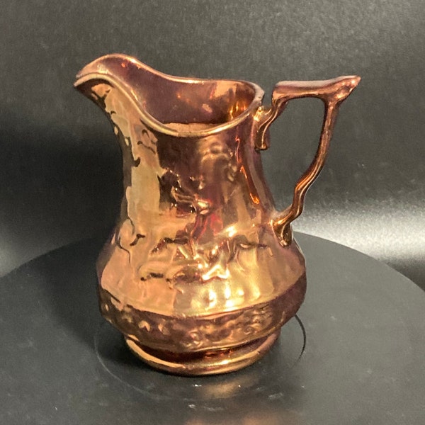 Antique Victorian ceramic  Wedgwood(?) copper lustre milk   jug in the fallow deer design,red clay