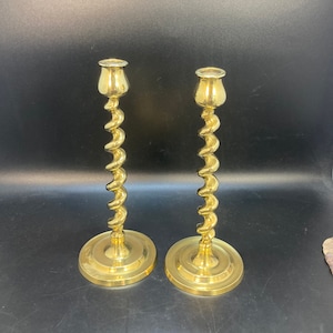 Vintage pair of brass /gilt metal ,yellow metal candleholders with twist stands (2)
