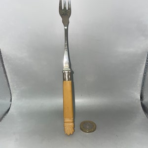 Antique long handle pickle fork, silver plated ,marked
