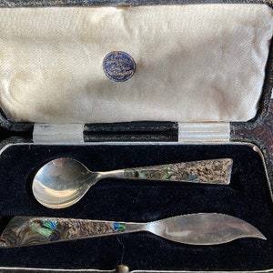 Vintage abalone shell ,marked sterling silver fruit knife and spoon set in fitting vintage box
