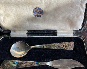 Vintage abalone shell ,marked sterling silver fruit knife and spoon set in fitting vintage box