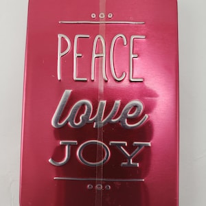 Lata de almacenamiento con diseño de paz, amor y alegría navideña