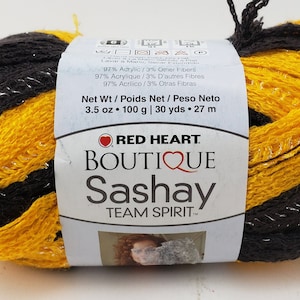 Red Heart Boutique Sashay Team Spirit-garen &quot;goud/zwart&quot; - 2 strengen