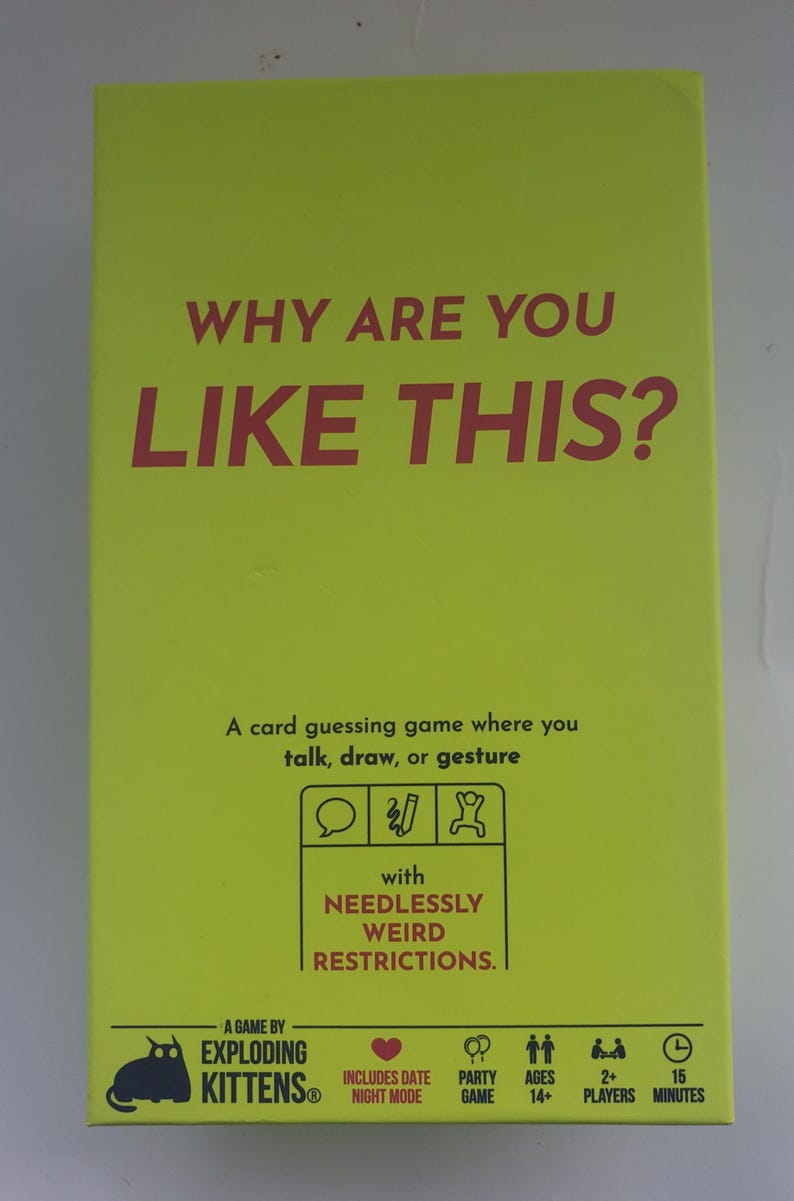 May include: A bright green box for the card game "Why Are You Like This?" with red text. The game is by Exploding Kittens and includes a card guessing game where you talk, draw, or gesture.