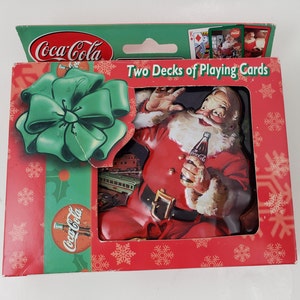 Coca-Cola Weihnachtsmann Sammeldose & zwei Spielkarten