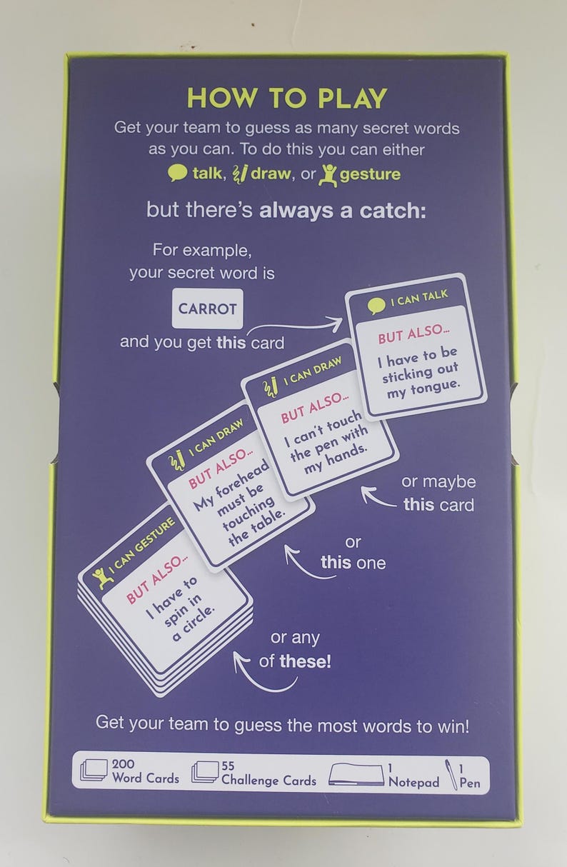 May include: A purple game box with yellow trim displays instructions for a word guessing game. The box shows example cards with phrases like "I can talk" and "I can draw." The game includes word cards, challenge cards, a notepad, and a pen.