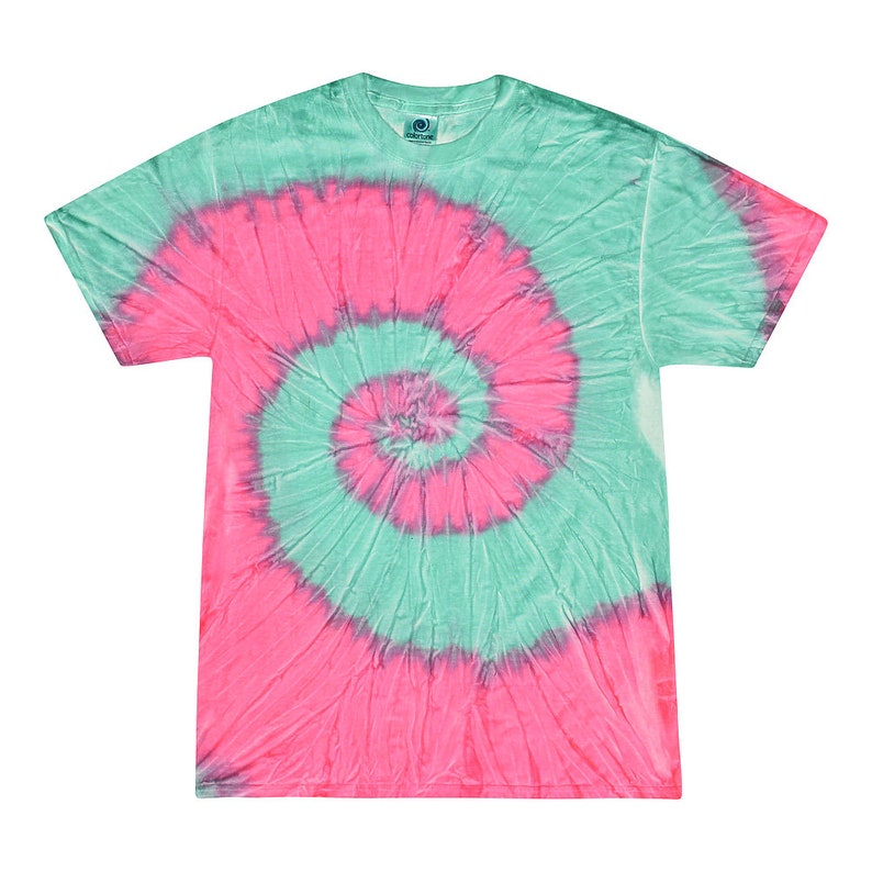 May include: A tie-dye t-shirt with a pink and green spiral pattern.
