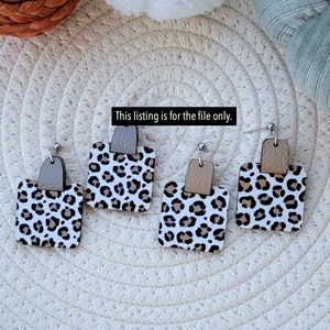 May include: Four pairs of square earrings with a leopard print design. Each earring has a white base with brown spots, topped with a small, rectangular piece of gray or tan leather. The text "This listing is for the file only" is visible.